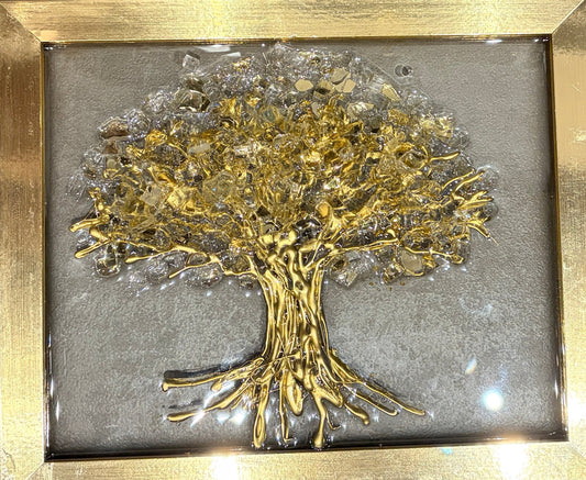 Handmade decorative art with a gold tree of life design on a clear background with a gold frame.